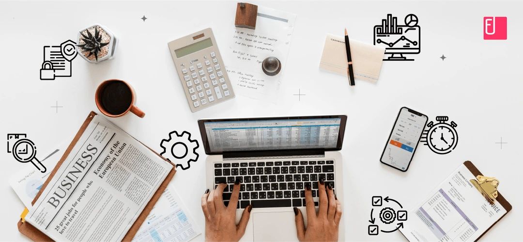 Business workspace with laptop and spreadsheet overhead view